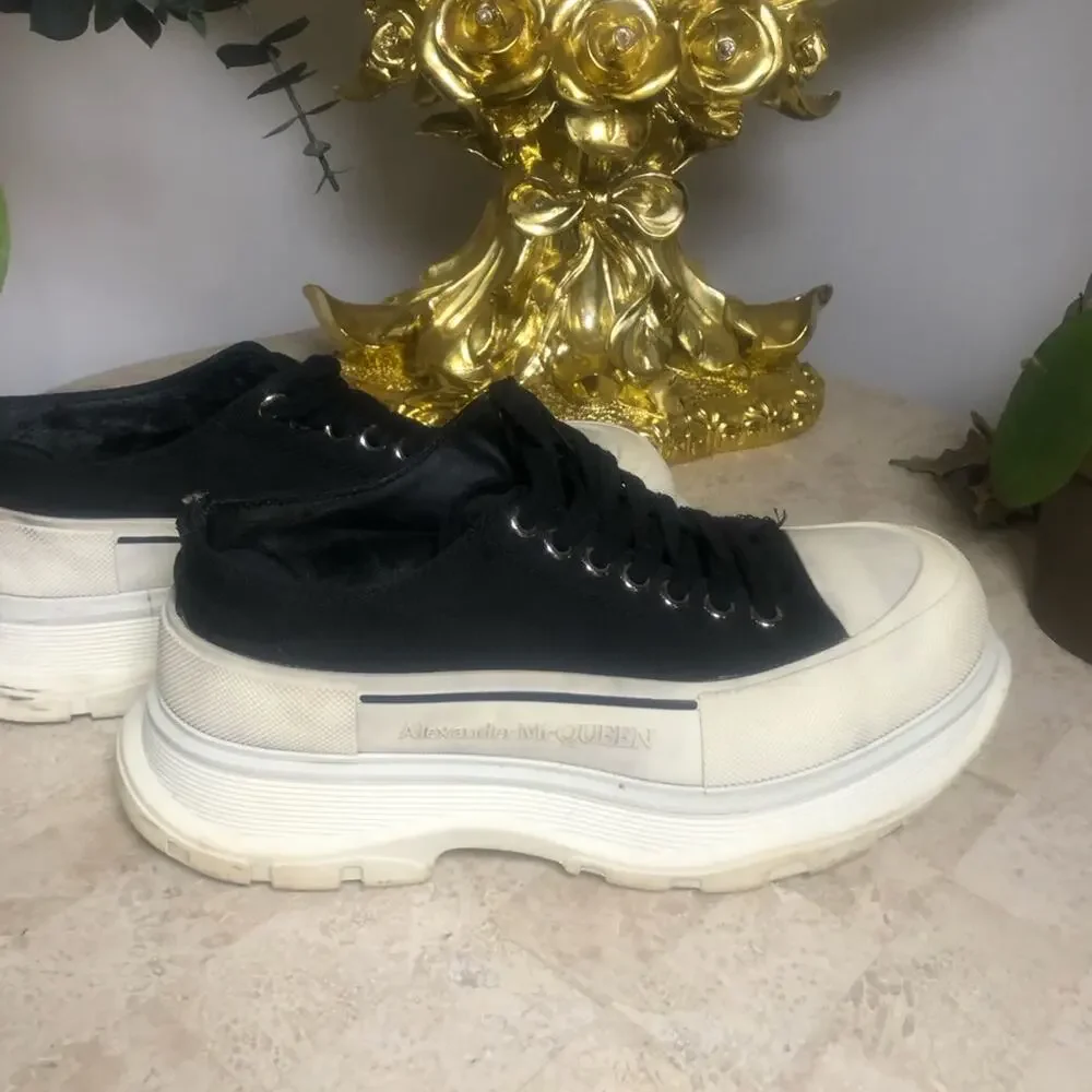 Alexander McQueen black and white platform chucks.